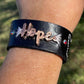 Leather cuff bracelet • Black leather • Hand tooled • Butterfly • HOPE • Pink accents • Hand stitched leather • Gifts for her • Electroformed jewelry