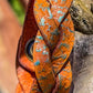 Mystery Braid Orange Leather Bracelet w/ distressed tooling & color shift paint.